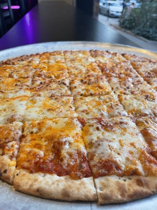 XL Thin Four Cheese Pizza.